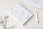Carnet fleuri – Blanc fleurs roses Atelier Pastourelle